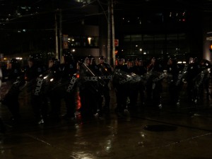DSC07412 Police from Barrie marching off to arrest peaceful protestors moving from the TD Centre to the Novotel Hotel. One of the police from Barrie told us to "go home." We realized the irony about 30 seconds later.