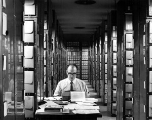 A whole lot of research ... Mel Starkman viewing records in the Archives of Ontario’s stacks. Photographer unknown [ca. 1968]. Archives of Ontario photographs, RG 17-43, I0009024 