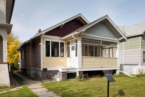 The McTaggart Residence was built in 1922 and is a good example of a common style of residential architecture in Edmonton from the mid-1910s to the early 1930s. Photo by James Dow, courtesy of City of Edmonton Sustainable Development.