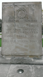 An image of the East York Civic Memorial, which is a slab that says '1914-1918' '1939-1945' In Grateful Tribute May Their Sacriice Be Not Forgotten. 1950 Korea 1953. And Our Special Forces