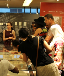 Danielle Manning, Outreach Officer at the Archives of Ontario, shows visitors the Archives’ exhibit area at Doors Open Toronto 2016