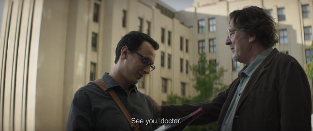Supervisor, congratulating successful PhD candidate
