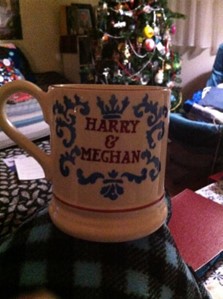 China mug with "Harry & Meghan" painted on it.