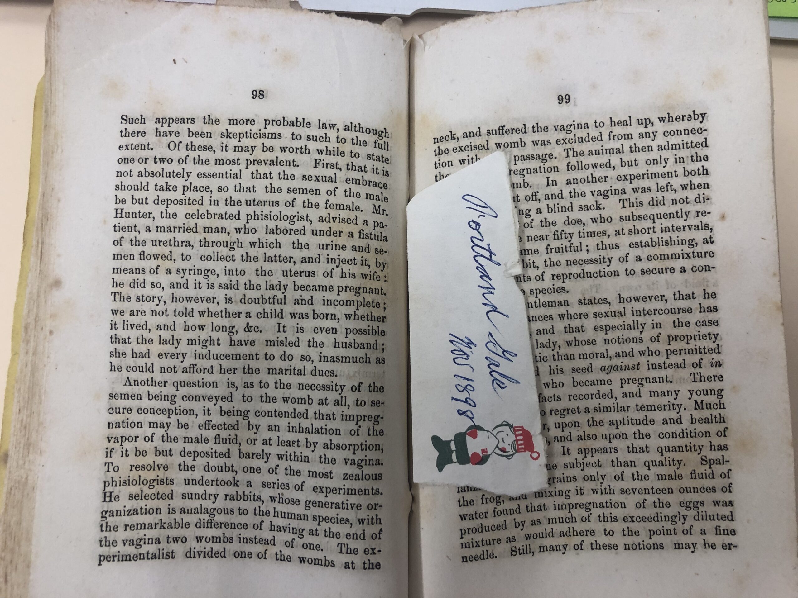 Woman and her Secret Passions (MC 4516 James Waddell family fonds) open to a page on impregnation; photo taken at PANB. 