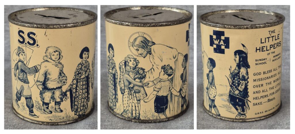 Three views of a can with a slit in the top. 
View 1: The label says "S.S." and the can is decorated with a drawing of three children, one in a kimono, one in a fur parka, and one flying a kite.
View 2: A drawing of Jesus Christ speaking with a group of children.
View 3:  A drawing of a child in buckskin clothes, holding a bow and arrow with feathers in their hair. There is a logo with the letters WA inside a cross. Text on the can reads: "The Little Helpers of the Sunday School Women's Auxiliary. God bless all the missionaries all over the world, and all the little helpers, for Jesus' sake. - Amen."