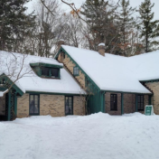 Exterior of Woodside National Historic Site, a historic house, in winter.